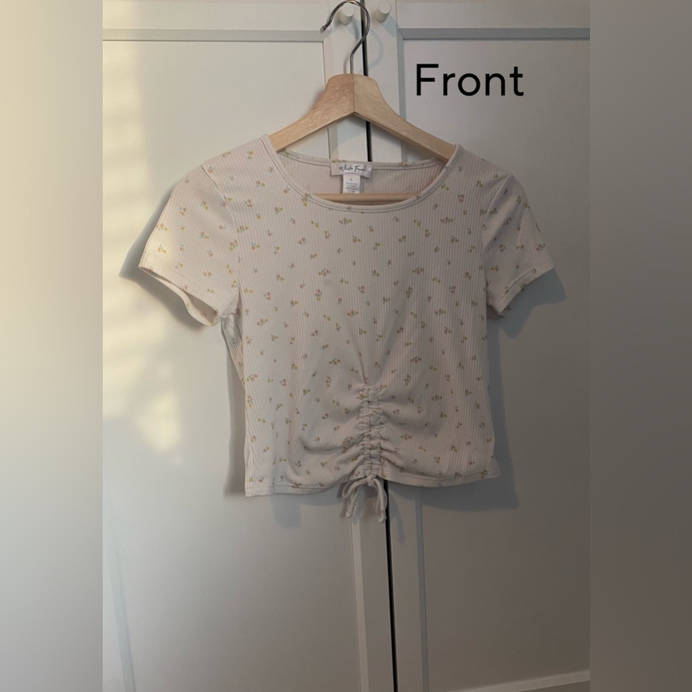 This floral cinched top is from Tilly’s in a girls large.